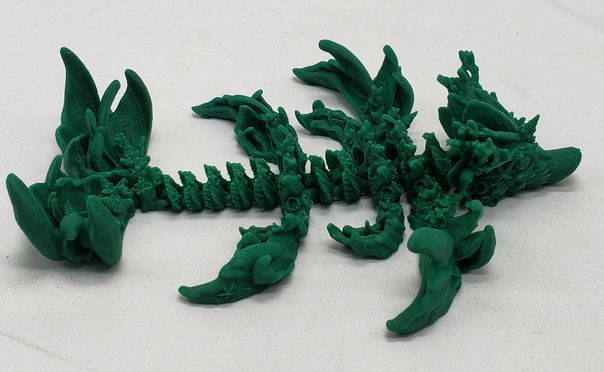 Load image into Gallery viewer, Articulated baby coral reef dragon
